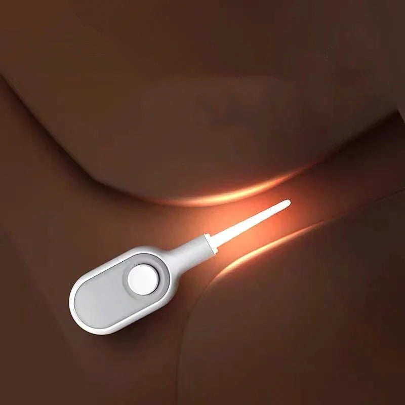 Baby Ear Cleaner with luminous earpick for safe earwax removal, white color, battery-operated