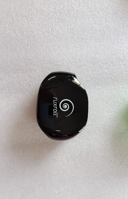 Automatic earphone cable winder in various colours, designed to keep earphone cords tidy and organised
