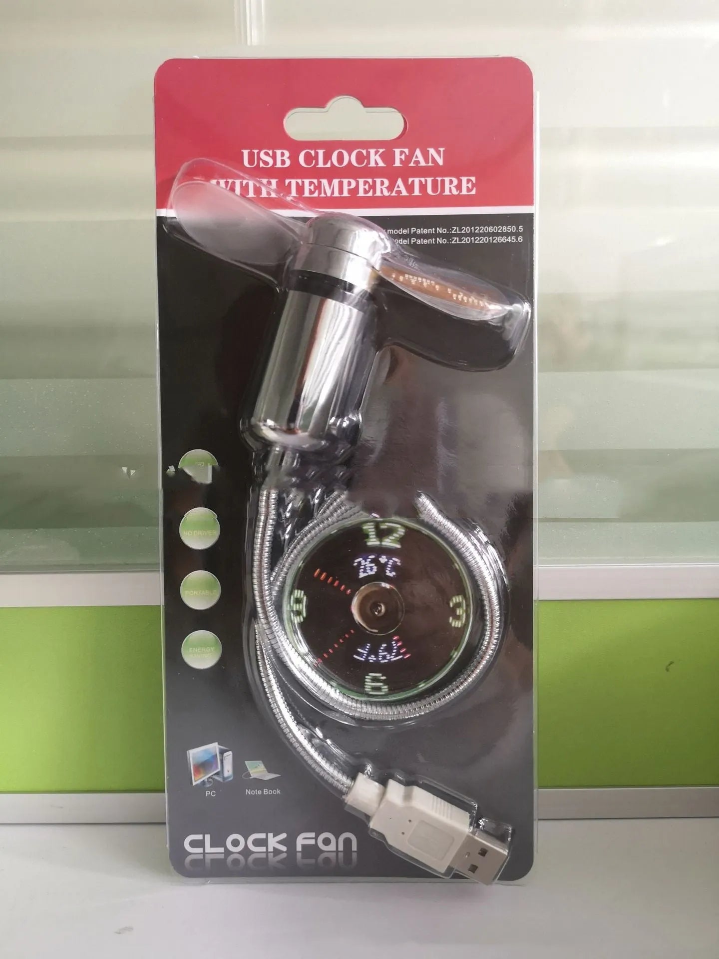 Silver USB desk fan with flexible metal neck and LED display showing time and temperature