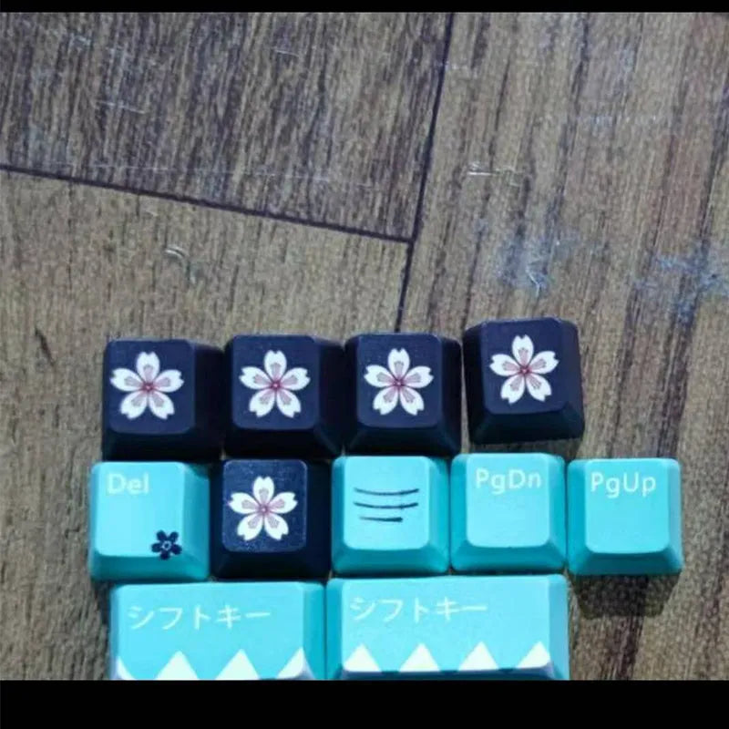 Set of green replacement keycaps for Cherry MX mechanical keyboards with a wireless USB dongle.