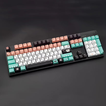 Set of green replacement keycaps for Cherry MX mechanical keyboards with a wireless USB dongle.
