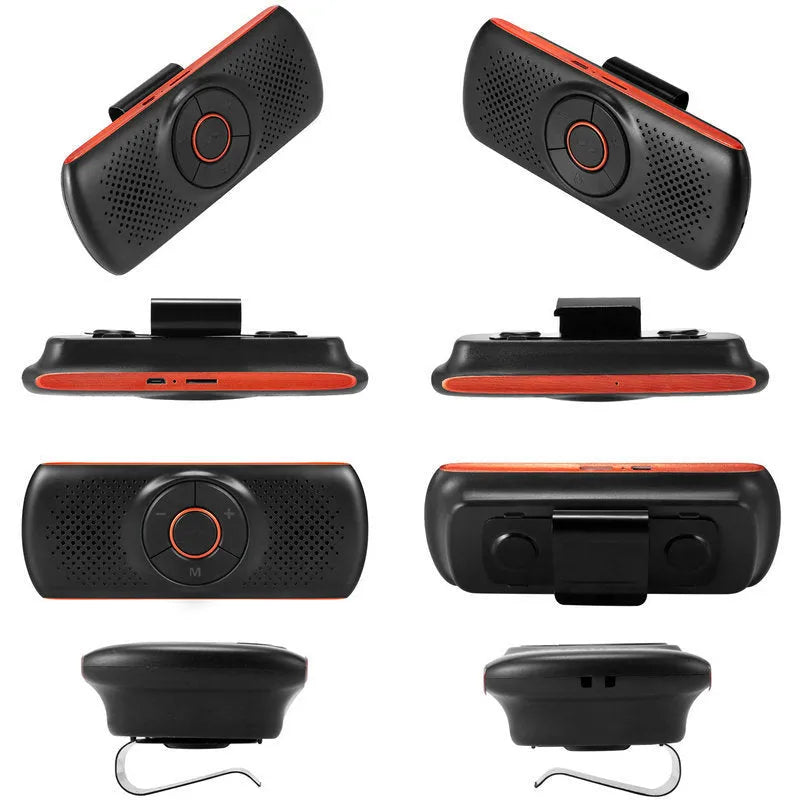 Orange plastic Bluetooth hands-free car speaker clipped to a car sun visor