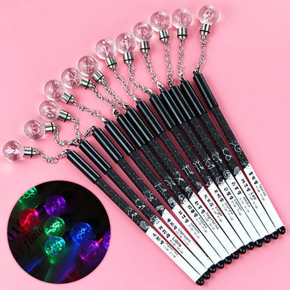 Twelve constellation-themed 0.5mm gel pens displayed with five design variants including pendant, bulb, and paper clip models