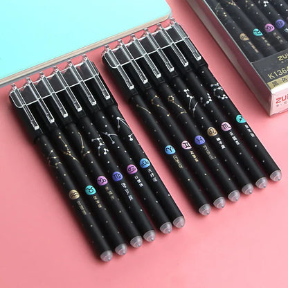 Twelve constellation-themed 0.5mm gel pens displayed with five design variants including pendant, bulb, and paper clip models
