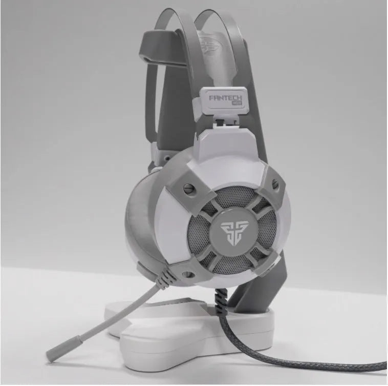 Gaming headset with USB connectivity and 7.1 surround sound, featuring 50mm drivers, a noise-cancelling microphone, and adjustable RGB lighting in black, designed for PC gaming with a 2.1m cable and in-line remote control.