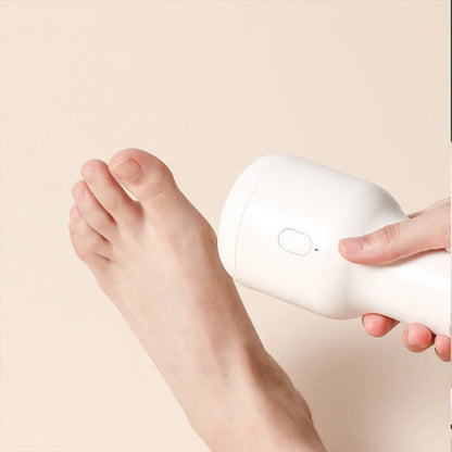Electric Foot File Grinder in pink, blue, and white for dead skin removal