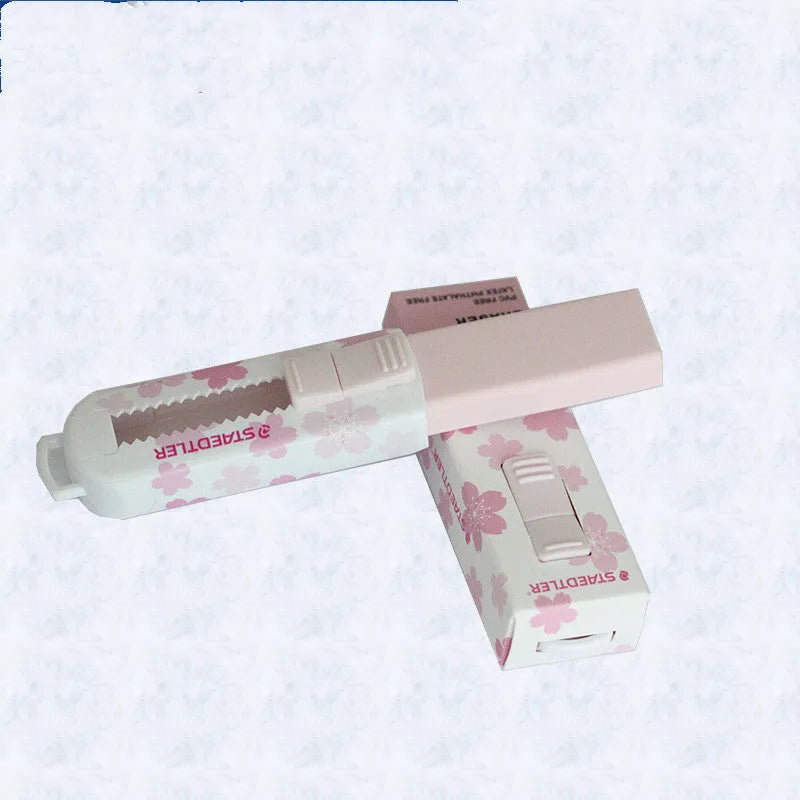 Square pink student rubber with replaceable core measuring 86mm by 26mm by 22mm