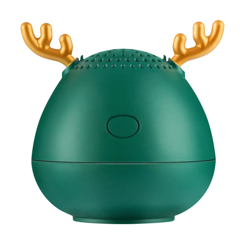 Compact portable Bluetooth speaker in white, pink or green with USB charging cable