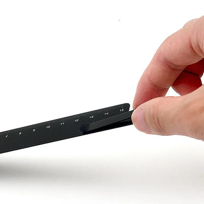 15cm black metal bookmark ruler with a laser-engraved scale on an aluminium alloy body.