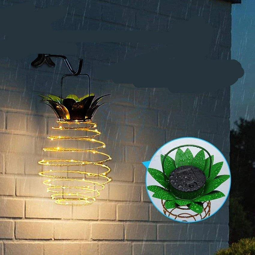 Solar-powered pineapple-shaped outdoor lights with a weather-resistant metal frame and warm white LED bulbs
