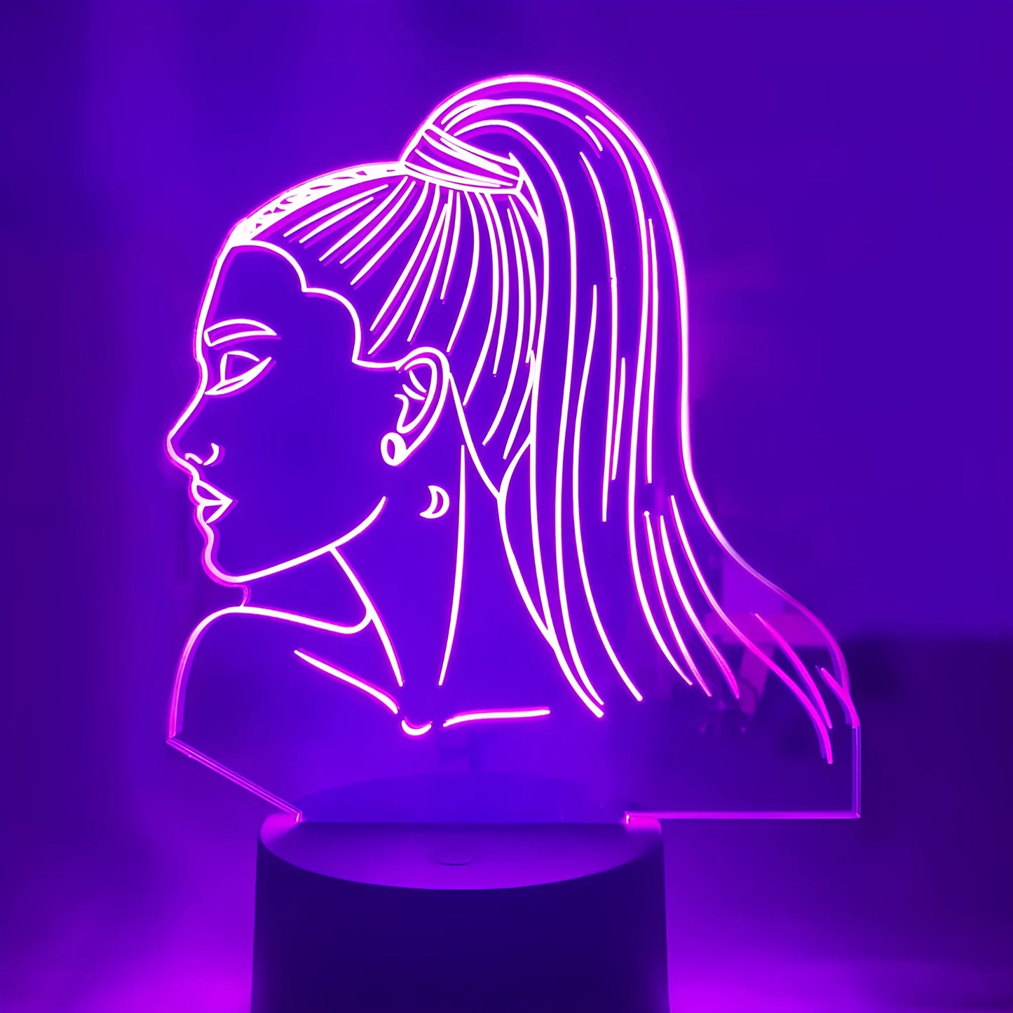 Black remote control LED desk lamp with acrylic shade on a desk