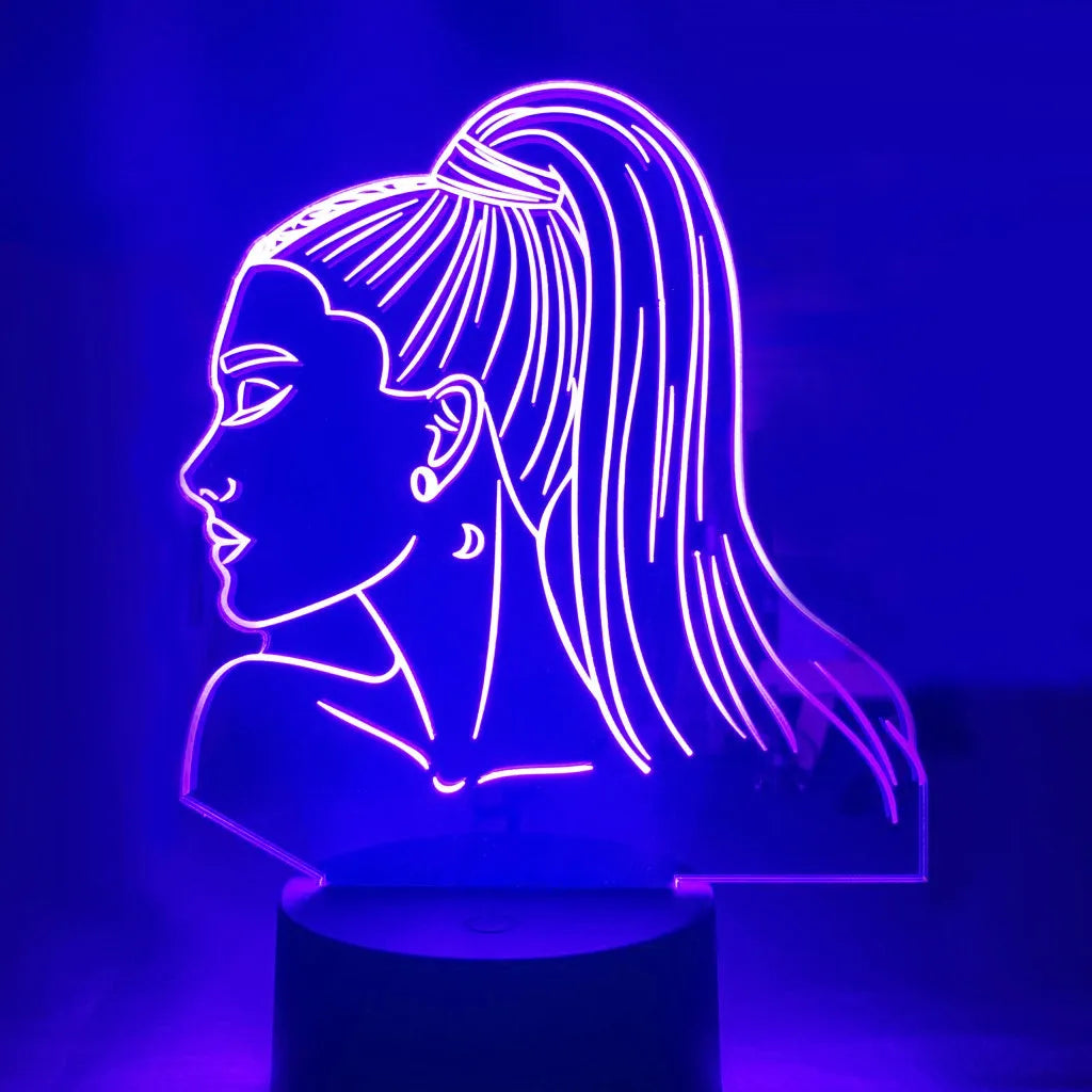 Black remote control LED desk lamp with acrylic shade on a desk
