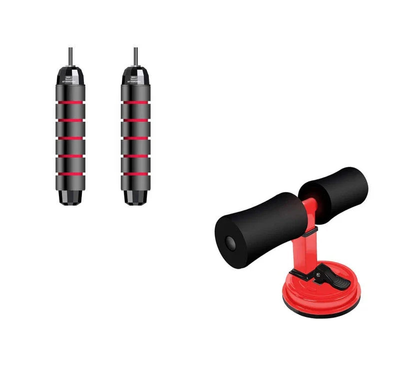 Compact sit-up strength trainer with steel springs and foam padding for home fitness