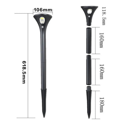 Solar-powered ground plug lawn light with metal stake and white LED lamp for outdoor pathways.