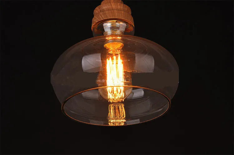 Glass wood grain single head pendant light with adjustable cord in Nordic style.
