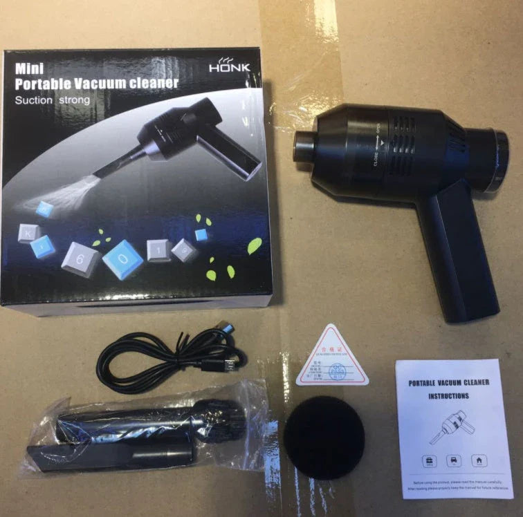 Cordless handheld mini vacuum cleaner with powerful suction for efficient dust and lint removal, compact and lightweight design, and convenient USB charging