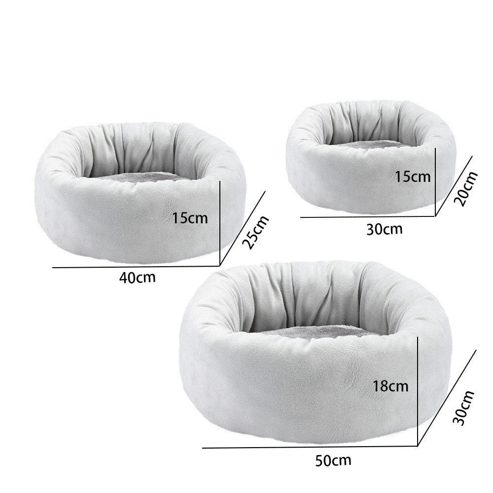 Cosy egg-shaped pet bed for cats and dogs, made with luxuriously soft and warm vegan faux shag fur