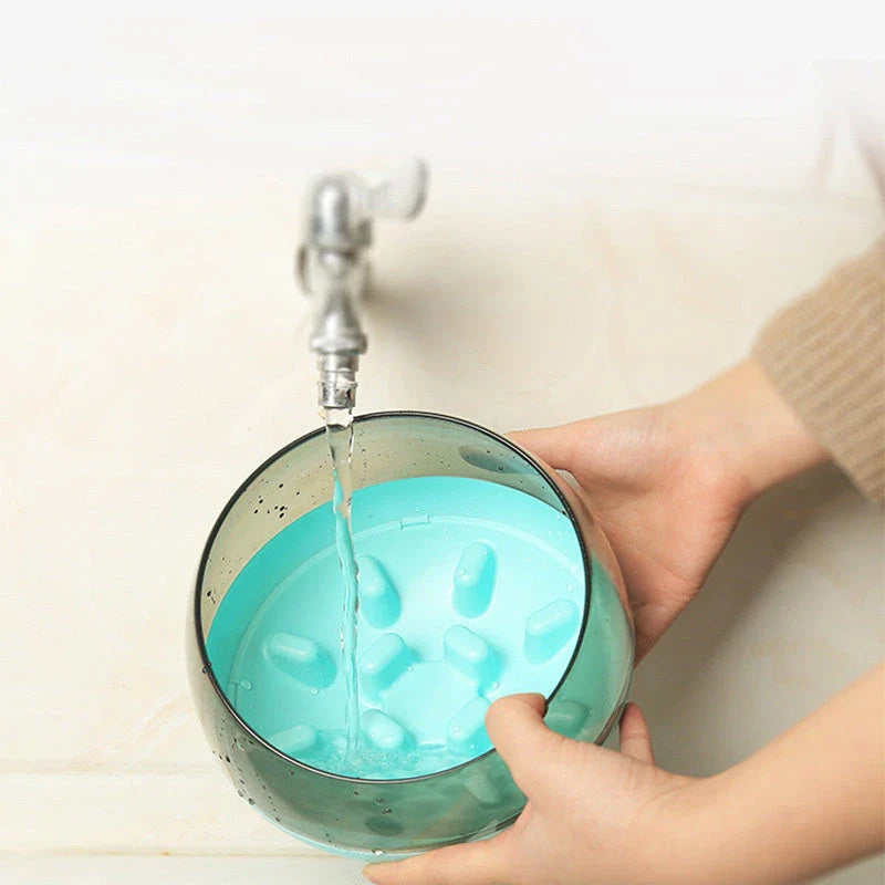 A stylish, space-inspired pet bowl with a slow-feed design to encourage healthier eating habits for dogs and cats.