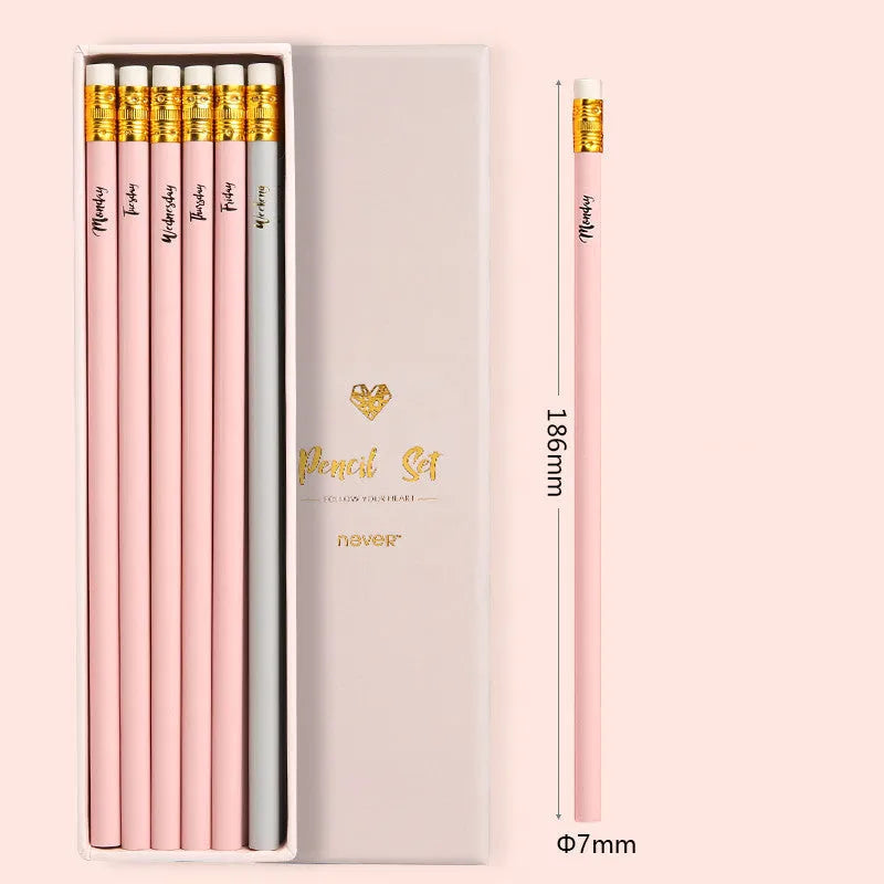 Display box of mixed colour HB writing pencils showing purple glitter and pale pink graphite pencils