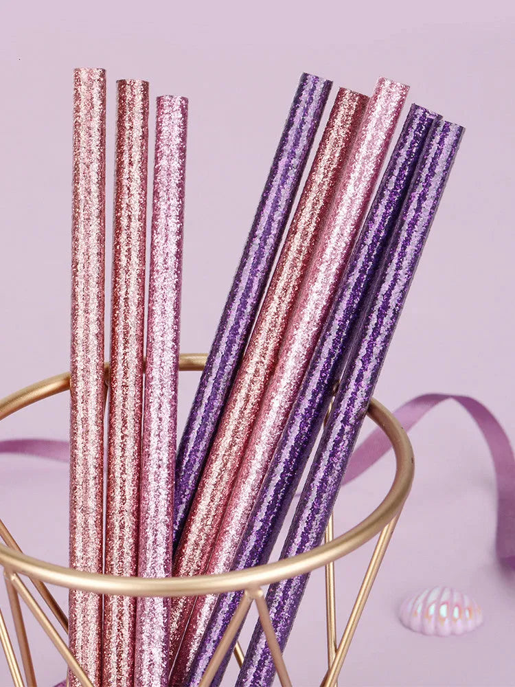 Display box of mixed colour HB writing pencils showing purple glitter and pale pink graphite pencils