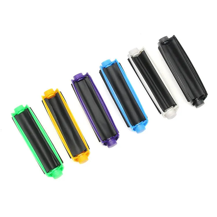 Manual cigarette maker for shredded tobacco, plastic cone rolling machine with 110mm cigarette cloth length, compact cigarette roller for DIY cigarettes in multiple colours including black, white, blue, purple, yellow and green.