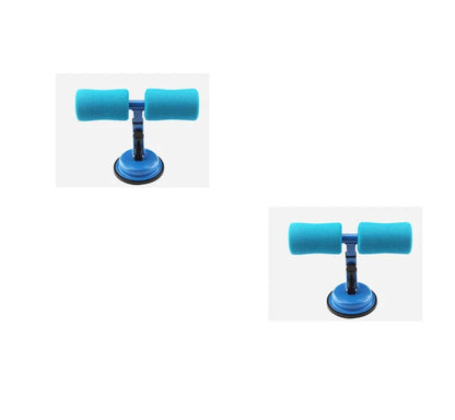 Compact sit-up strength trainer with steel springs and foam padding for home fitness