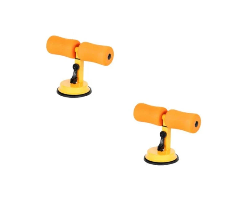 Compact sit-up strength trainer with steel springs and foam padding for home fitness