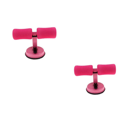 Compact sit-up strength trainer with steel springs and foam padding for home fitness