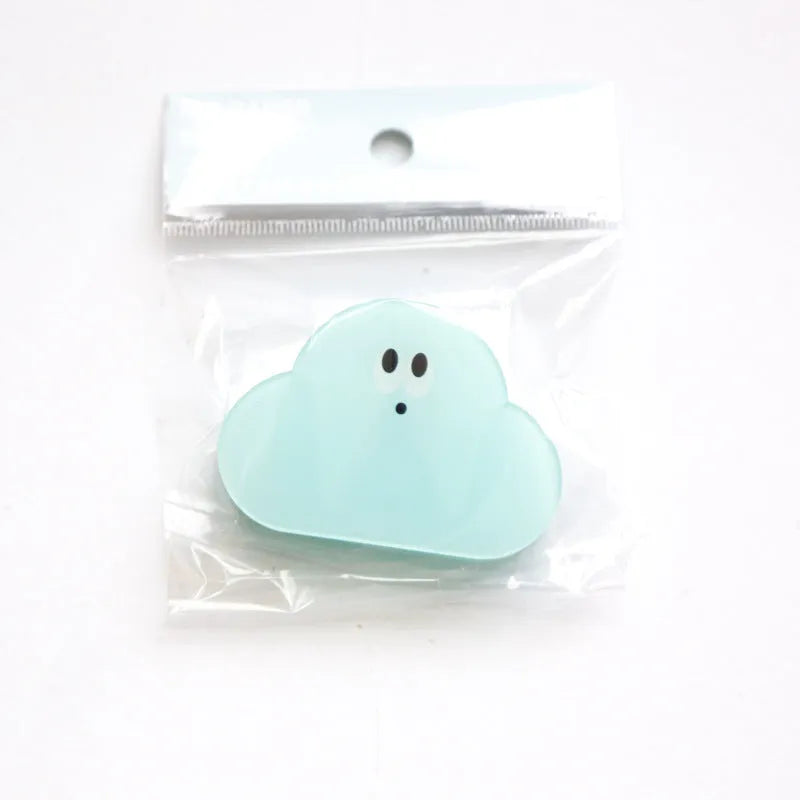 Colourful cartoon design printed on a transparent acrylic stationery clip.