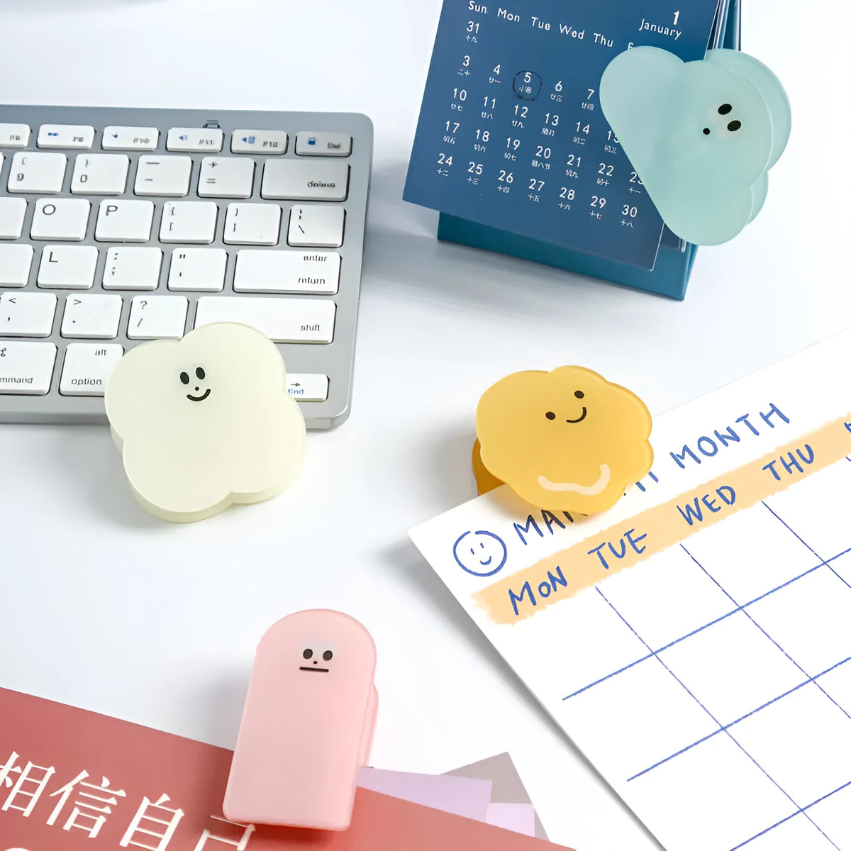 Colourful cartoon design printed on a transparent acrylic stationery clip.