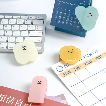 Colourful cartoon design printed on a transparent acrylic stationery clip.