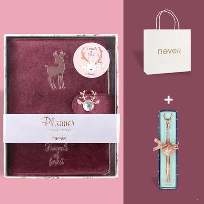 A6 loose-leaf notebook with blue velvet cloth cover open to show binder rings and paper.