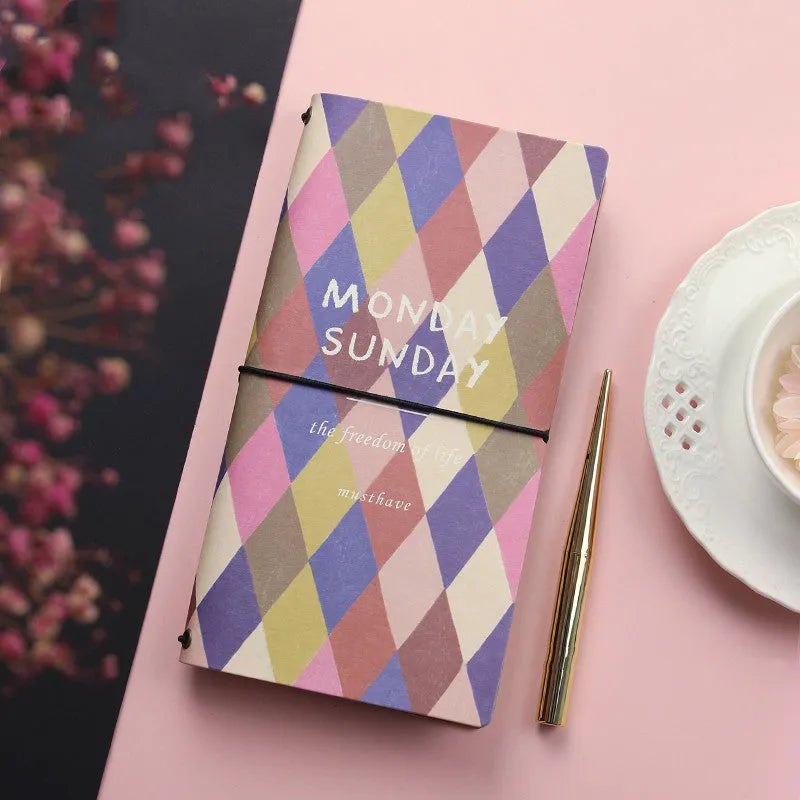 Simple style TN hand book notebook with a soft cover, shown in one of five available colours.