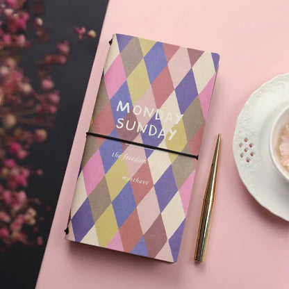 Simple style TN hand book notebook with a soft cover, shown in one of five available colours.
