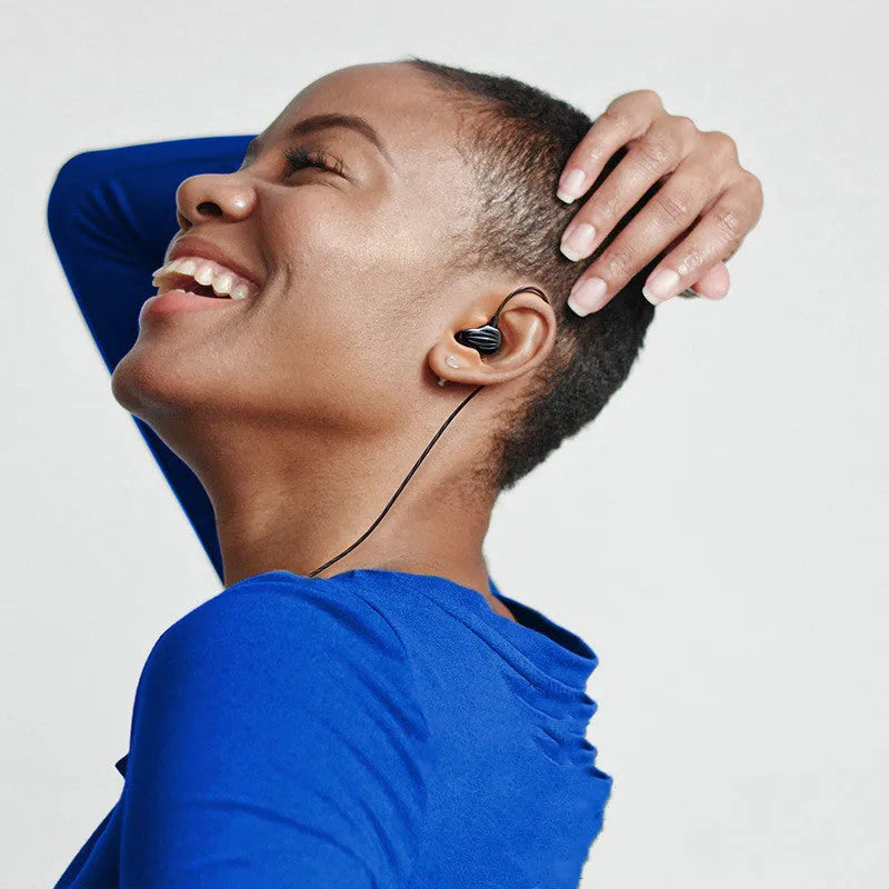 Back-wound in-ear sports headphones with 3.5mm plug in white, red, or black colours