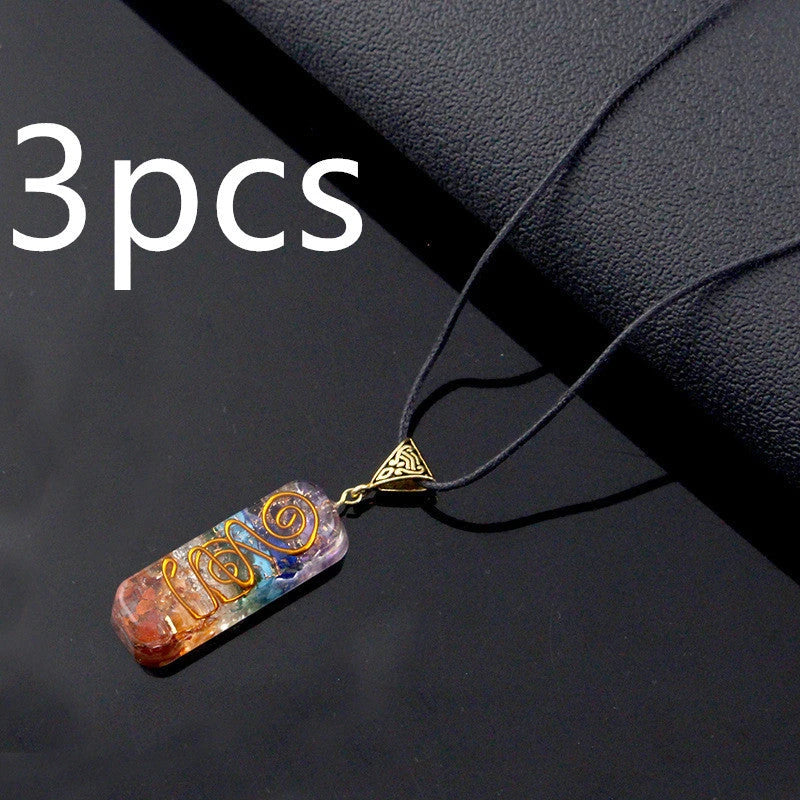 Handcrafted natural crystal seven chakra pendant with unique geometric design