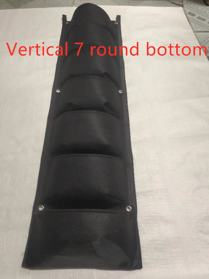 Vertical wall garden planter with multiple planting pockets made from recycled felt material