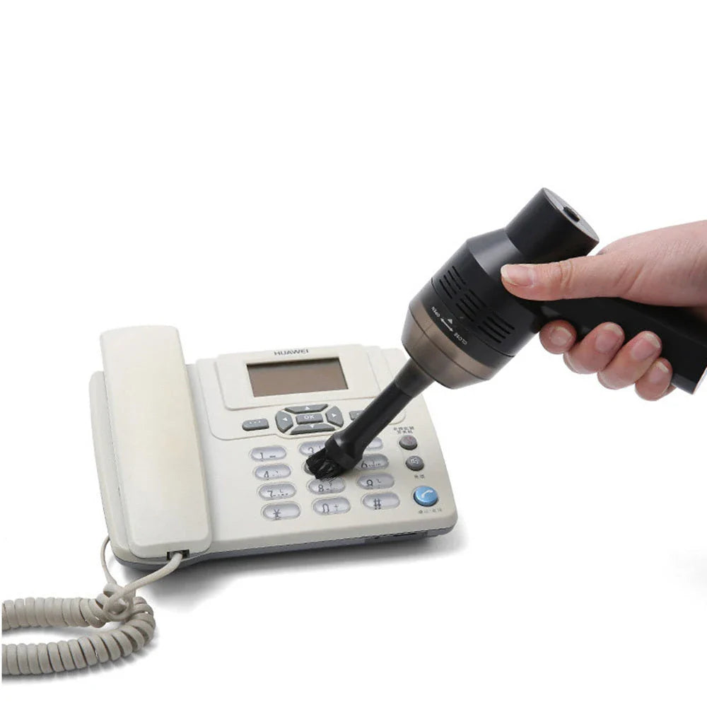 Cordless handheld mini vacuum cleaner with powerful suction for efficient dust and lint removal, compact and lightweight design, and convenient USB charging