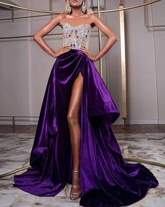 A long, shimmering sequin dress in a vibrant purple color, perfect for formal or semi-formal events.