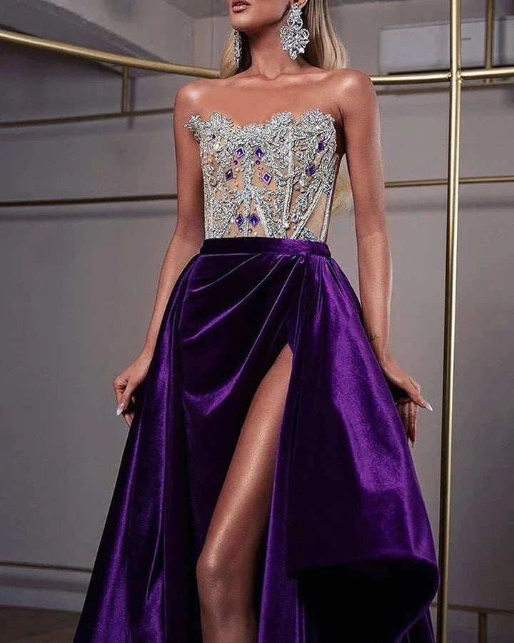 A long, shimmering sequin dress in a vibrant purple color, perfect for formal or semi-formal events.