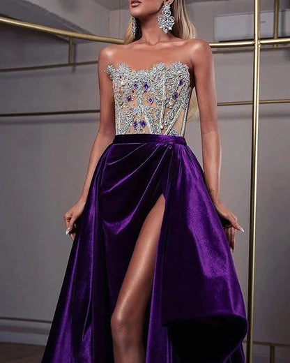 A long, shimmering sequin dress in a vibrant purple color, perfect for formal or semi-formal events.