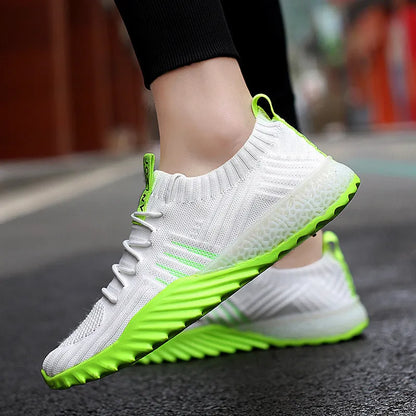 Flying woven mesh breathable sneakers in white orange, white green or black orange with rubber sole and flat heel