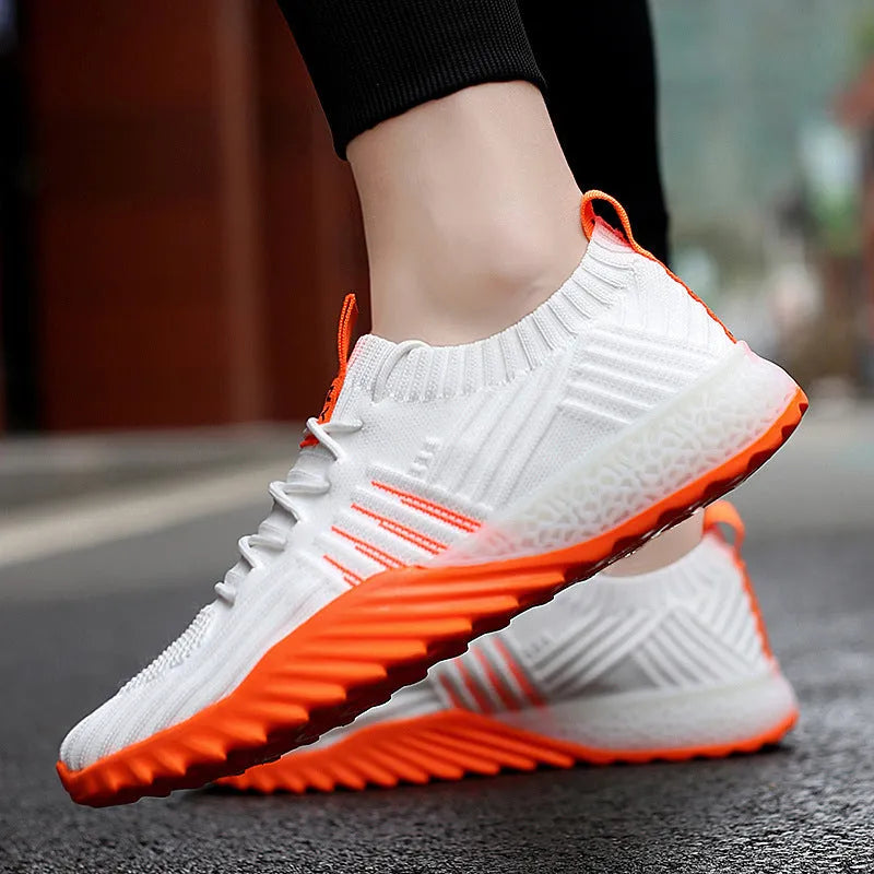 Flying woven mesh breathable sneakers in white orange, white green or black orange with rubber sole and flat heel