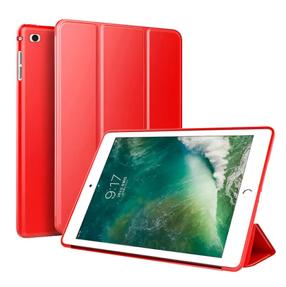 Black clamshell case for iPad Air 2 with built-in silicone stand folded out, showing tablet propped up.