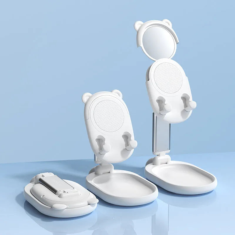 Blue adjustable desk phone holder with mirror for Apple iPhones and tablets on a wooden desk