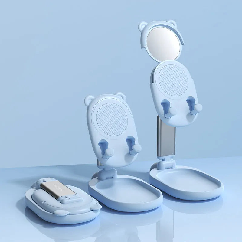Blue adjustable desk phone holder with mirror for Apple iPhones and tablets on a wooden desk