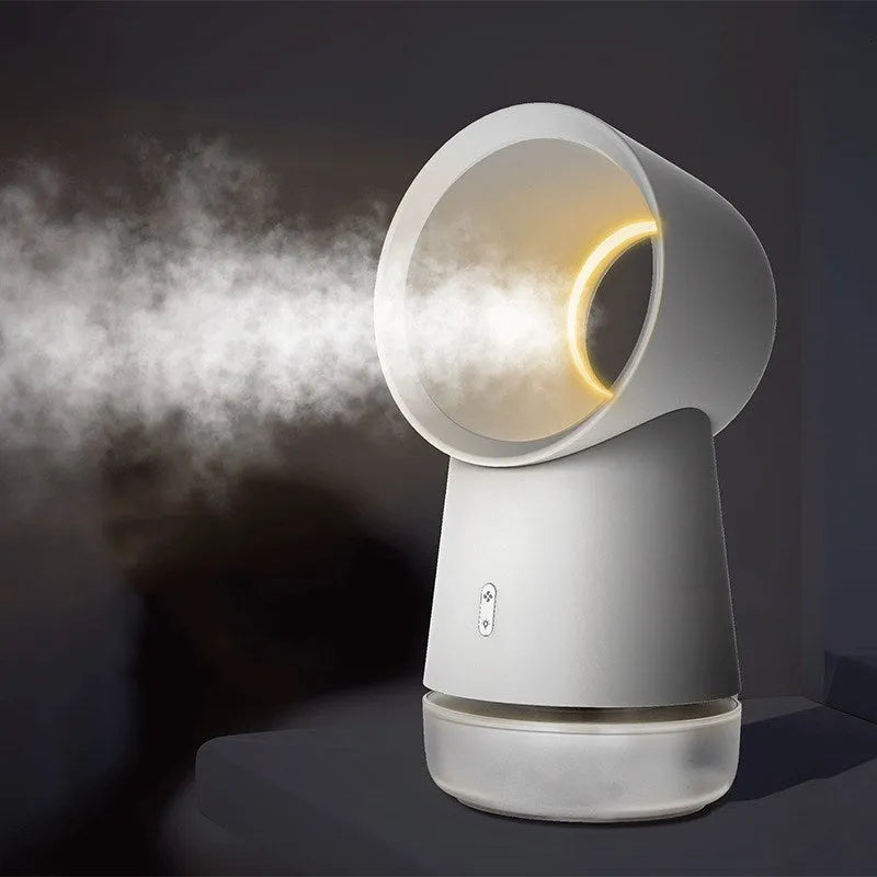 White round desktop humidifier with leafless fan, USB cable, and single mist outlet on a desk