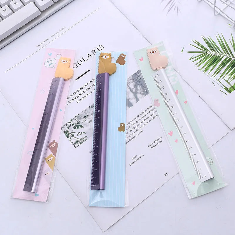 Colourful Alpaca design on a 30cm silver aluminium ruler with centimetre and millimetre markings.
