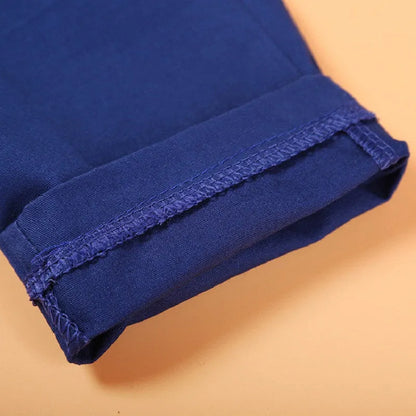 Blue boys' formal clothing set with turtleneck, waistcoat, tie, and trousers for toddlers.