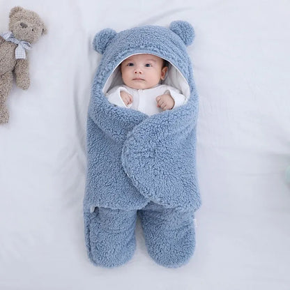 Baby quilted sleeping bag wrapper in cotton blend fabric showing size and colour options